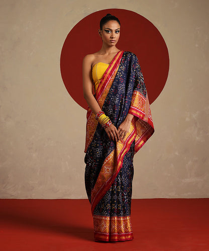 Navy_Blue_And_Mustard_Double_Shade_Pure_Mulberry_Silk_Ikat_Patola_Saree_WeaverStory_02