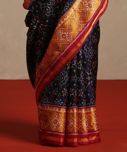 Navy_Blue_And_Mustard_Double_Shade_Pure_Mulberry_Silk_Ikat_Patola_Saree_WeaverStory_04