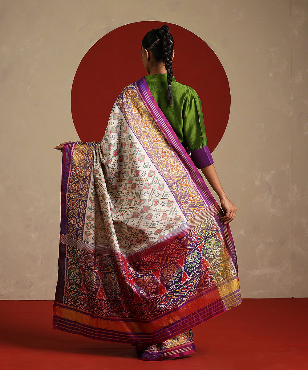 Handloom_Offwhite_And_Purple_Double_Shade_Pure_Mulberry_Silk_Ikat_Patola_Saree_WeaverStory_03