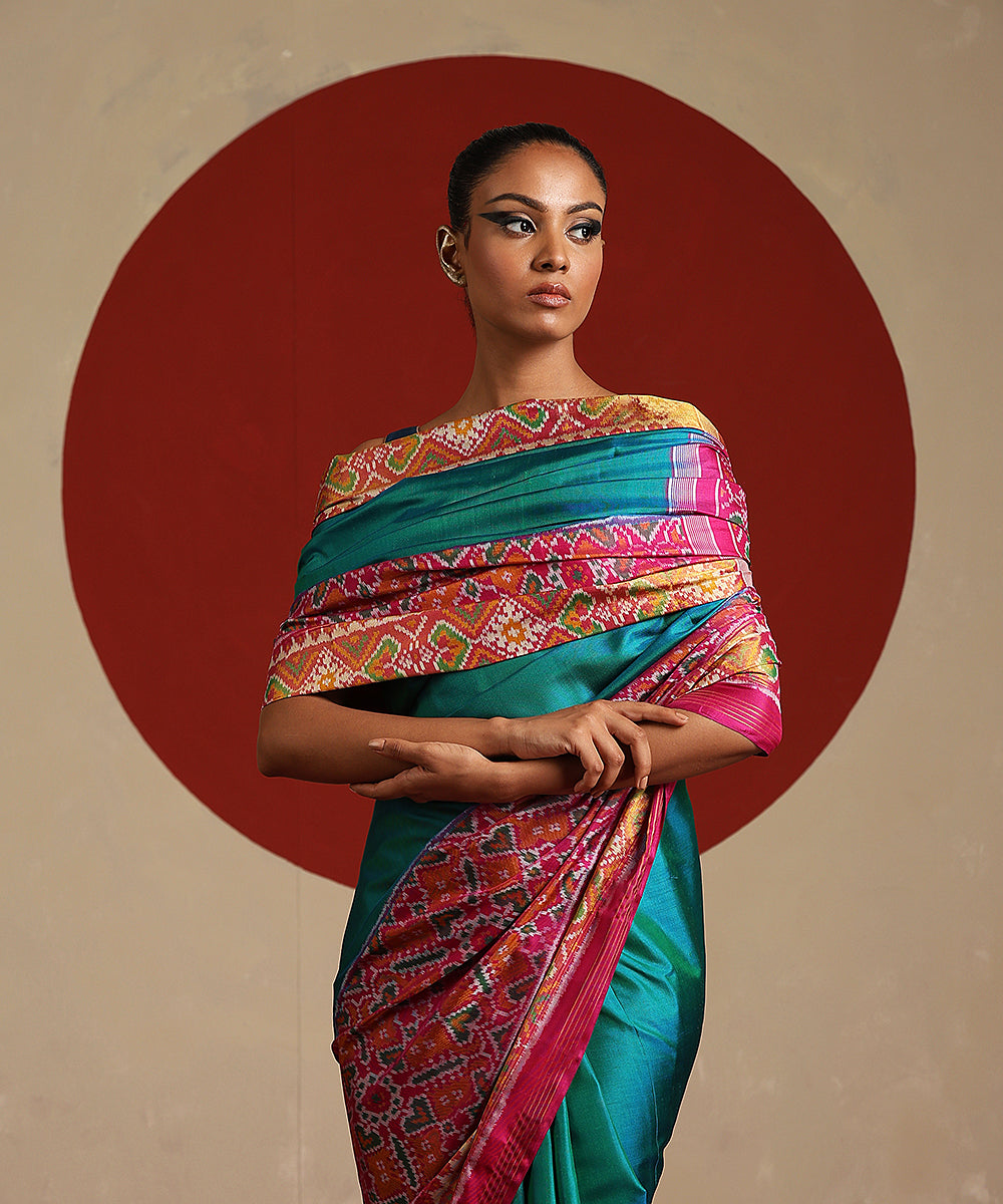 Handloom_Sea_Green_And_Hot_Pink_Double_Shade_Pure_Mulberry_Silk_Ikat_Patola_Saree_WeaverStory_01