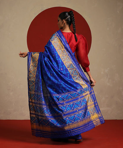 Mustard_And_Electric_Blue_Double_Shade_Handloom_Pure_Mulberry_Silk_Ikat_Patola_Saree_WeaverStory_03