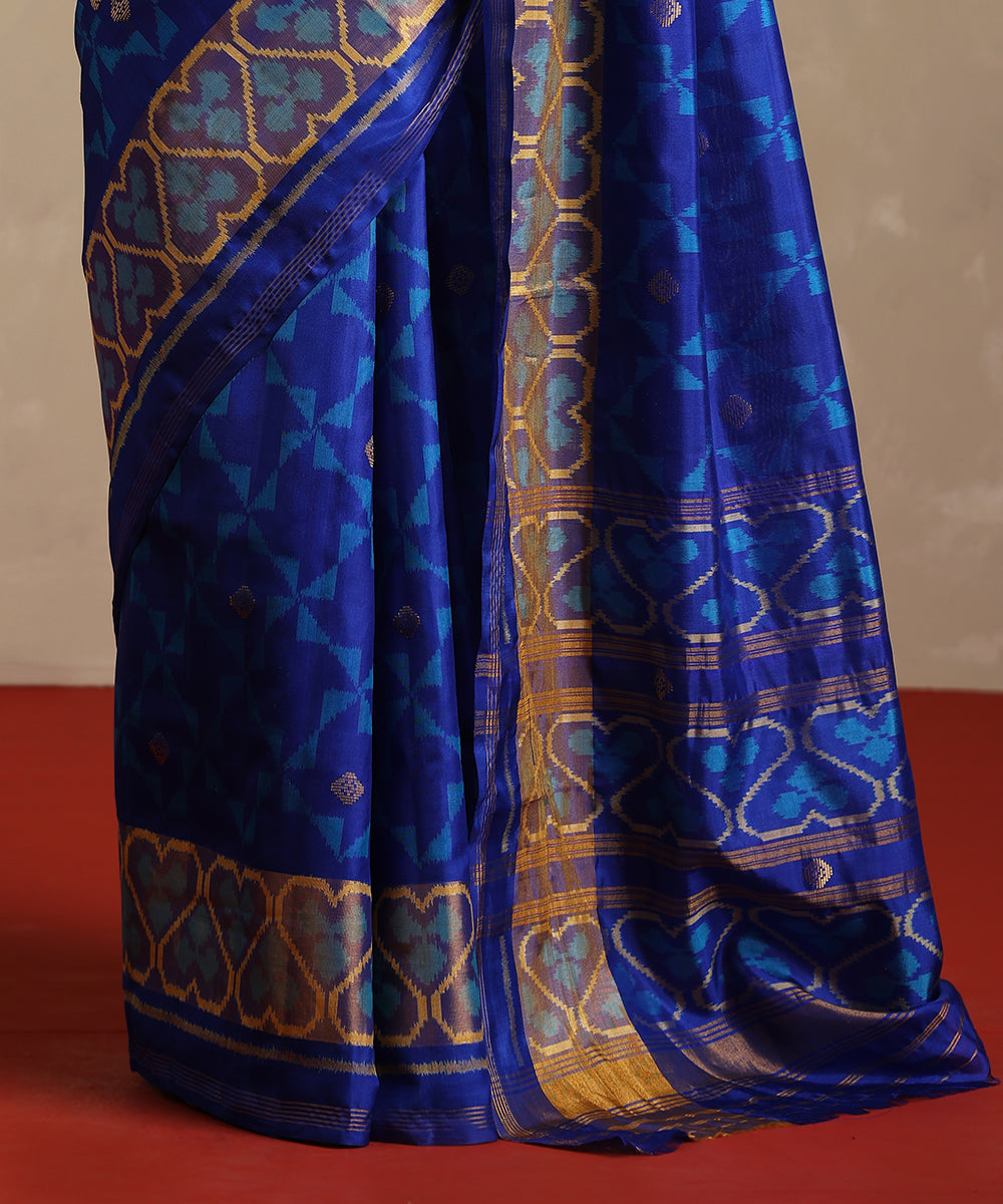 Mustard_And_Electric_Blue_Double_Shade_Handloom_Pure_Mulberry_Silk_Ikat_Patola_Saree_WeaverStory_04