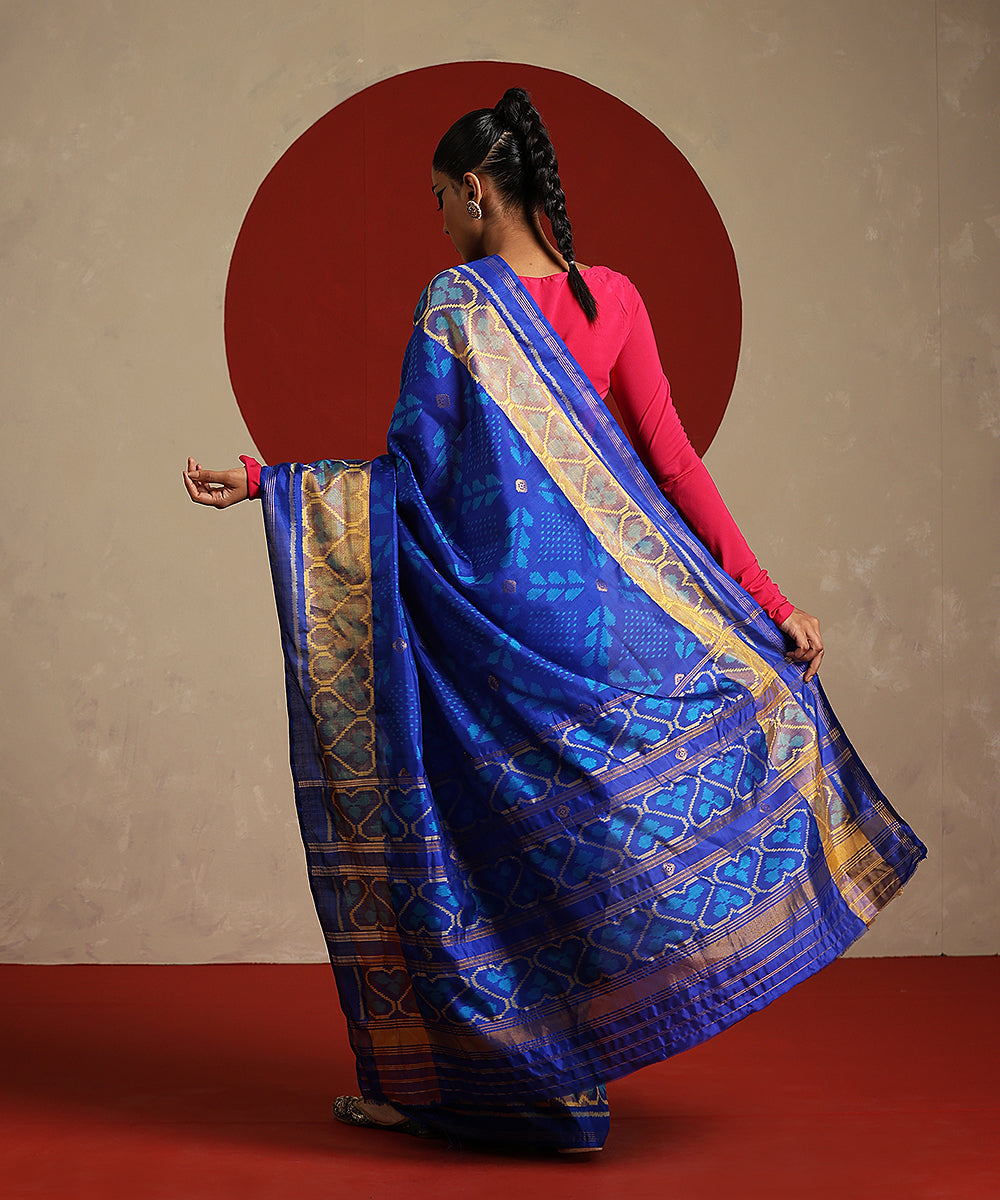 Electric_Blue_And_Mustard_Double_Shade_Handloom_Pure_Mulberry_Silk_Ikat_Patola_Saree_WeaverStory_03