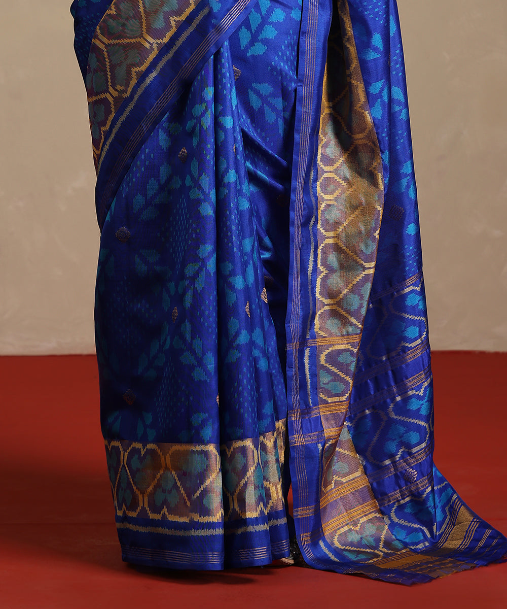 Electric_Blue_And_Mustard_Double_Shade_Handloom_Pure_Mulberry_Silk_Ikat_Patola_Saree_WeaverStory_04