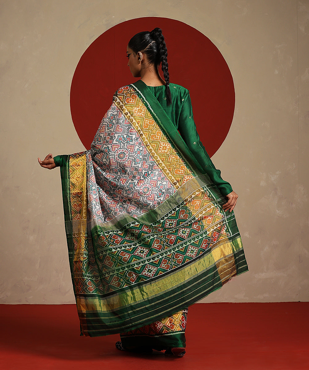 Offwhite_And_Green_Double_Shade_Pure_Mulberry_Silk_Ikat_Patola_Saree_WeaverStory_03