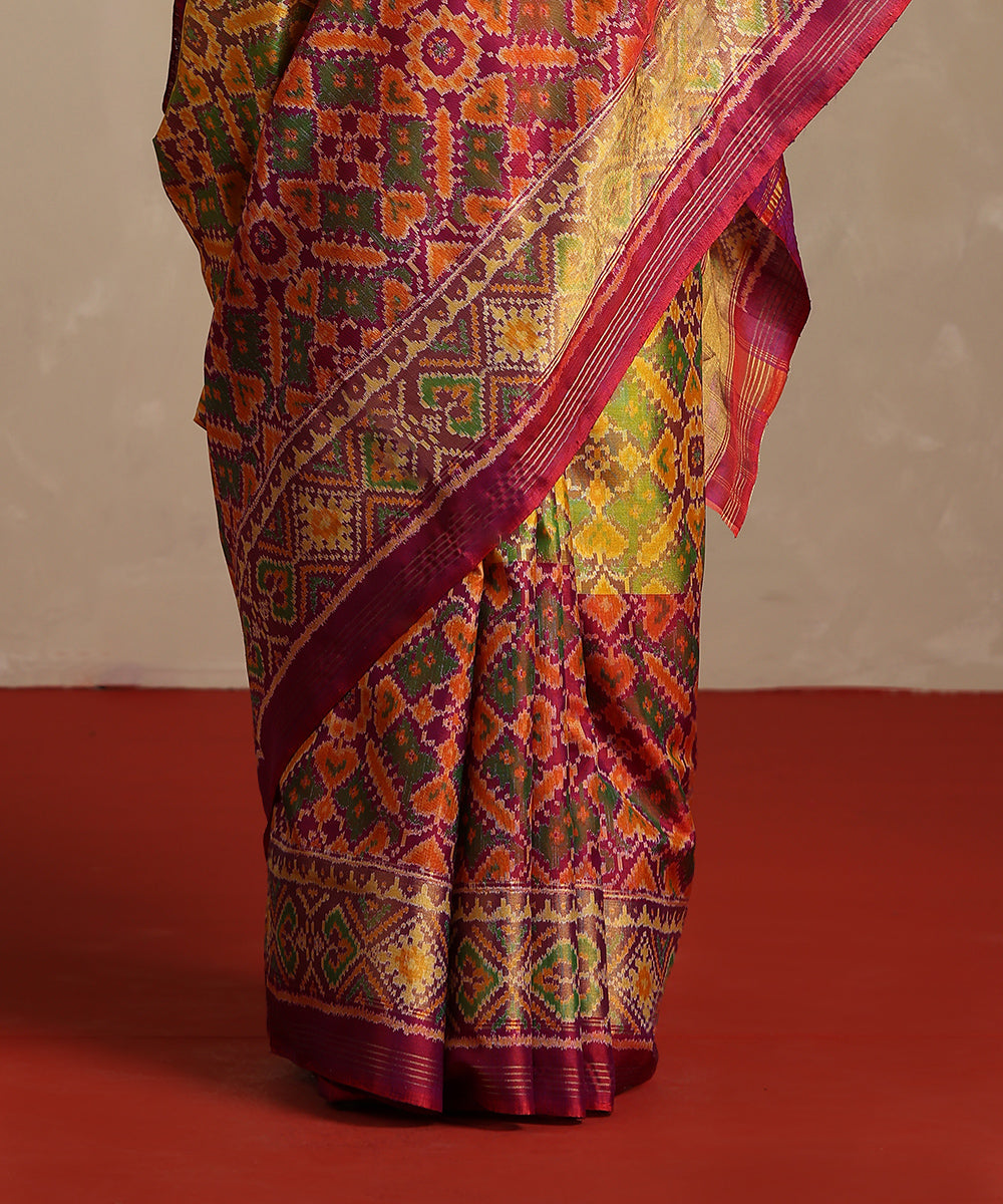 Handloom_Yellow_And_Purple_Double_Shade_Pure_Mulberry_Silk_Ikat_Patola_Saree_WeaverStory_04