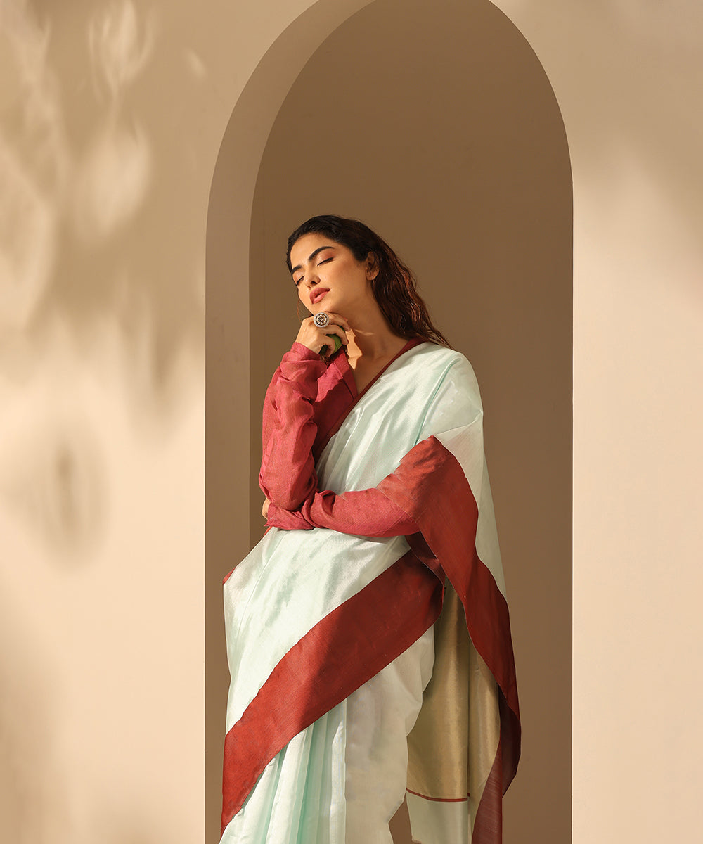 Sky_Blue_Handloom_Plain_Pure_Chanderi_Silk_Saree_With_Maroon_Mashroo_Border_WeaverStory_01