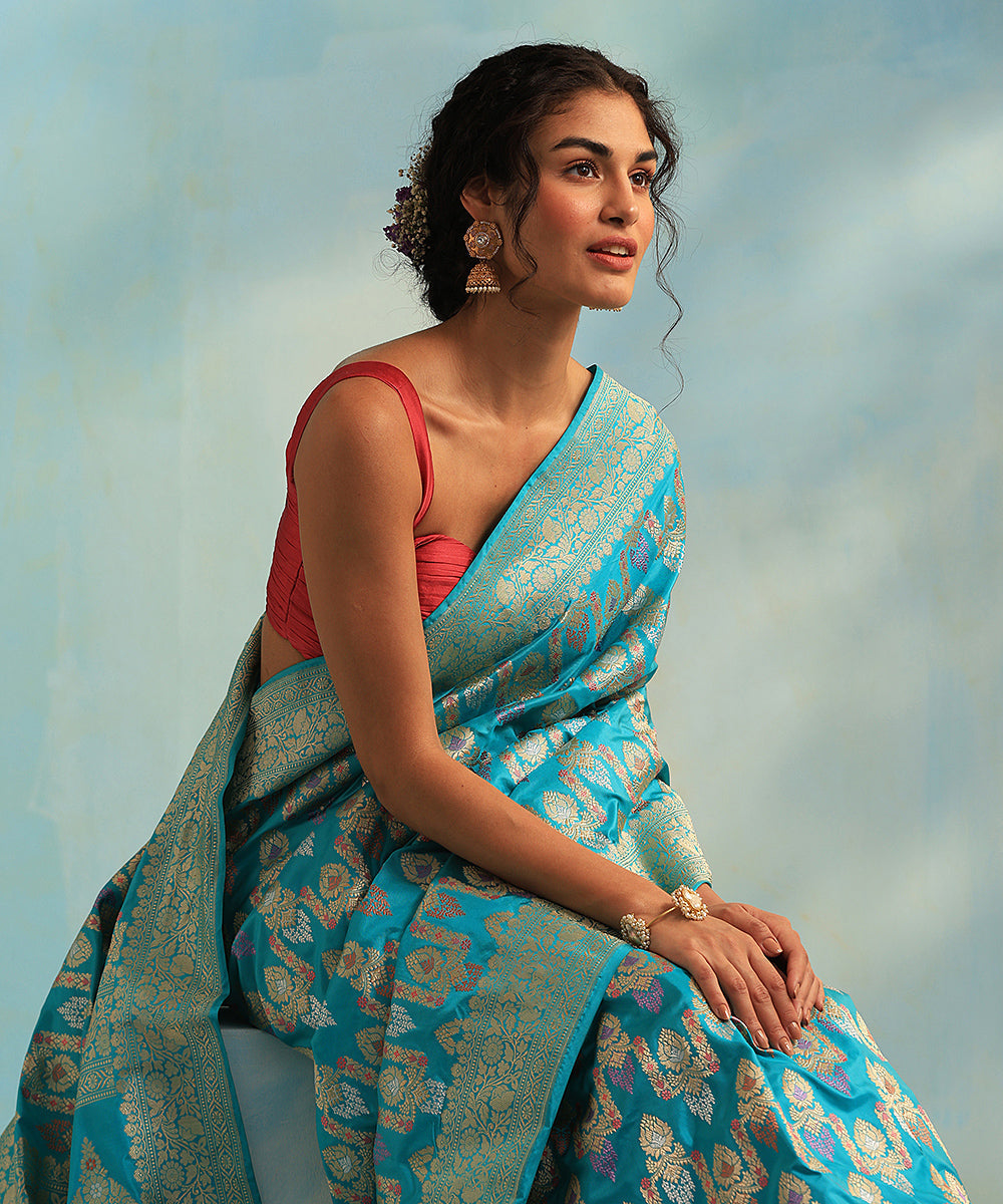 Handloom_Turquoise_Blue_Pure_Katan_Silk_Banarasi_Saree_With_Kadhwa_Jangla_And_Sona_Rupa_Zari_WeaverStory_01