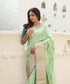 Pistachio_Green_Handloom_Pure_Katan_Silk_Banarasi_Saree_With_Grey_Satin_Border_WeaverStory_01