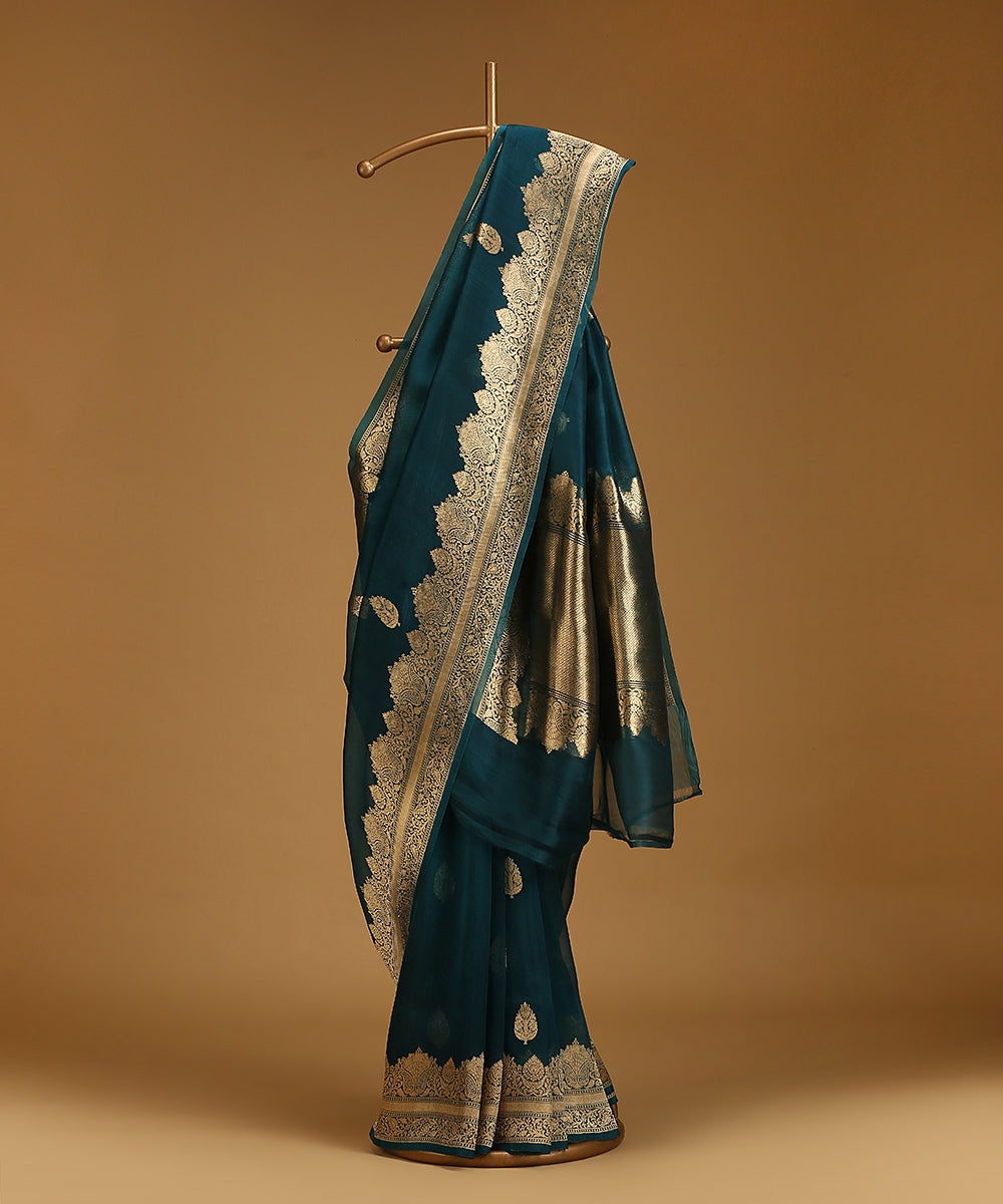 Handloom_Teal_Blue_Pure_Organza_Silk_Banarasi_Saree_With_Gold_Zari_Border_And_Kadhwa_Boota_WeaverStory_01