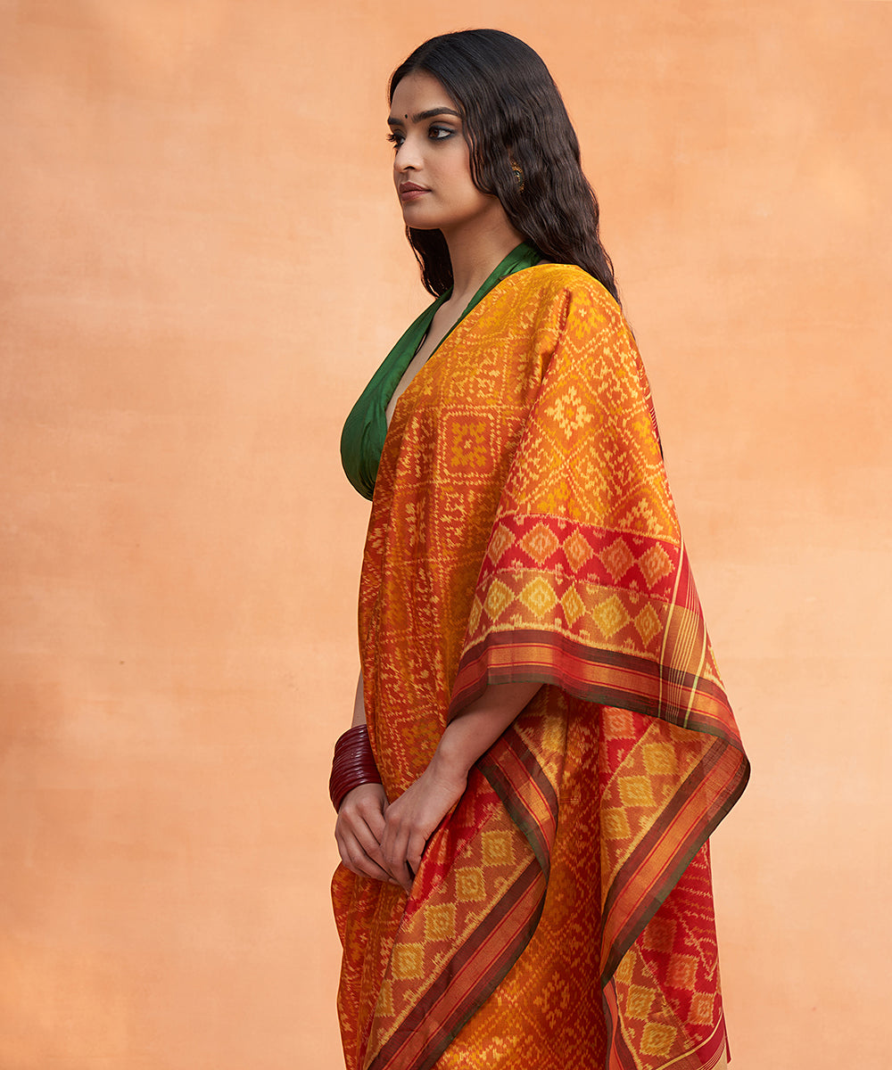 Red_And_Mustard_Handloom_Pure_Mulberry_Silk_Ikat_Patola_Saree_With_Green_Tissue_Border_WeaverStory_01