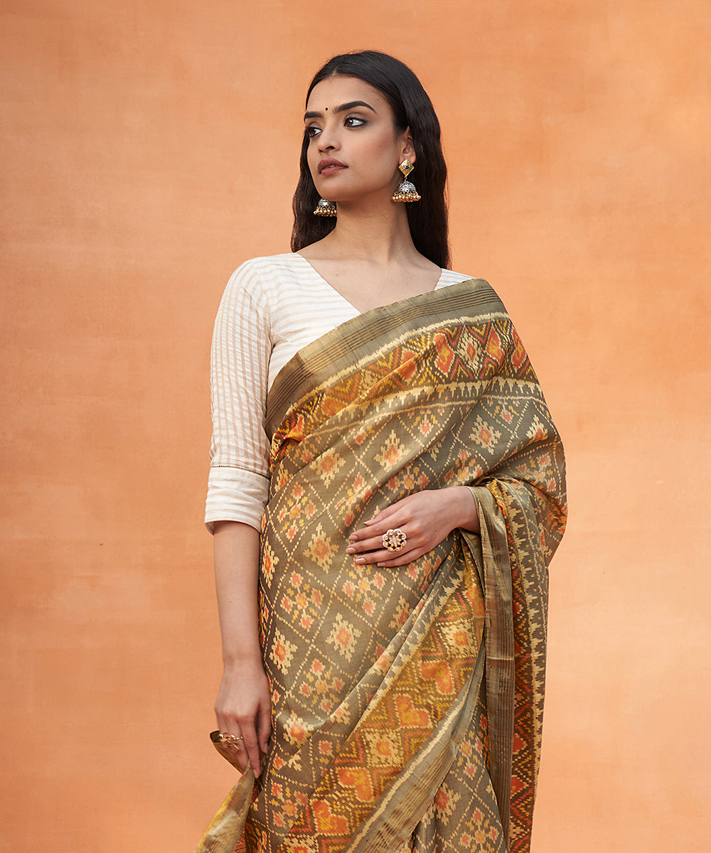 Handloom_Grey_And_Yellow_Pure_Mulberry_Silk_Ikat_Patola_Saree_With_Tissue_Border_WeaverStory_01
