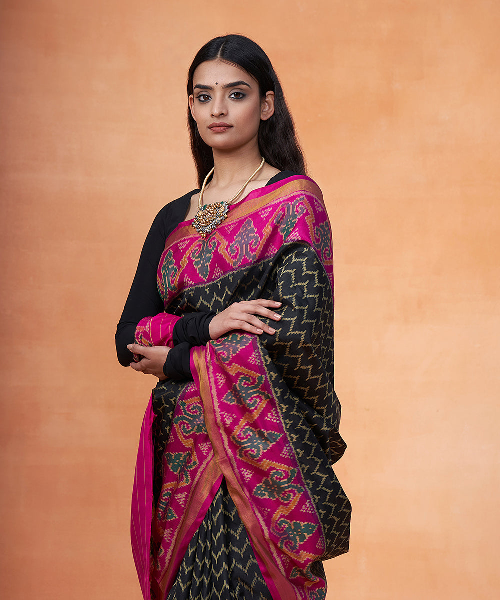 Handloom_Black_And_Pink_Pure_Mulberry_Silk_Ikat_Patola_Saree_With_Tissue_Border_WeaverStory_01