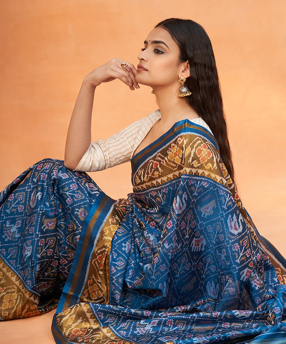Teal_Blue_Handloom_Pure_Mulberry_Silk_Ikat_Patola_Saree_With_Tissue_Border_WeaverStory_01