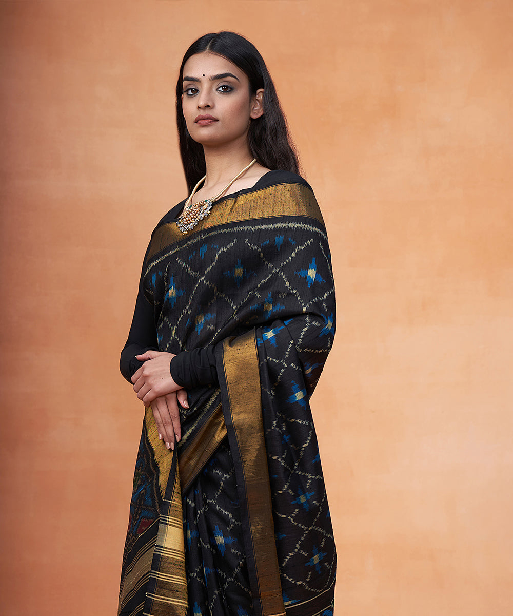 Teal_Blue_And_Black_Pure_Raw_Silk_Ikat_Patola_Saree_With_Zari_Border_WeaverStory_01