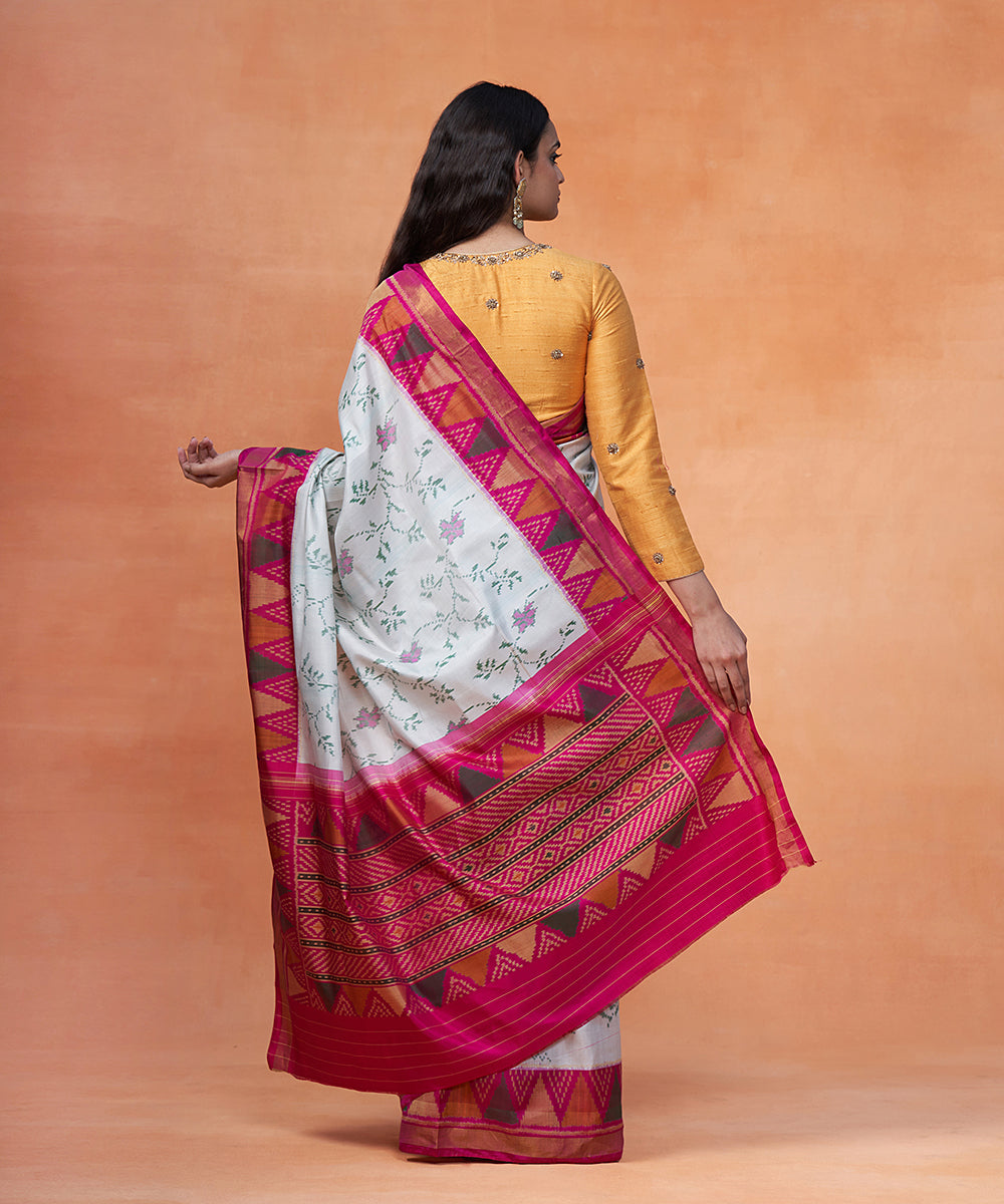 Handloom_White_And_Pink_Pure_Mulberry_Silk_Ikat_Patola_Saree_With_Zari_Border_WeaverStory_03