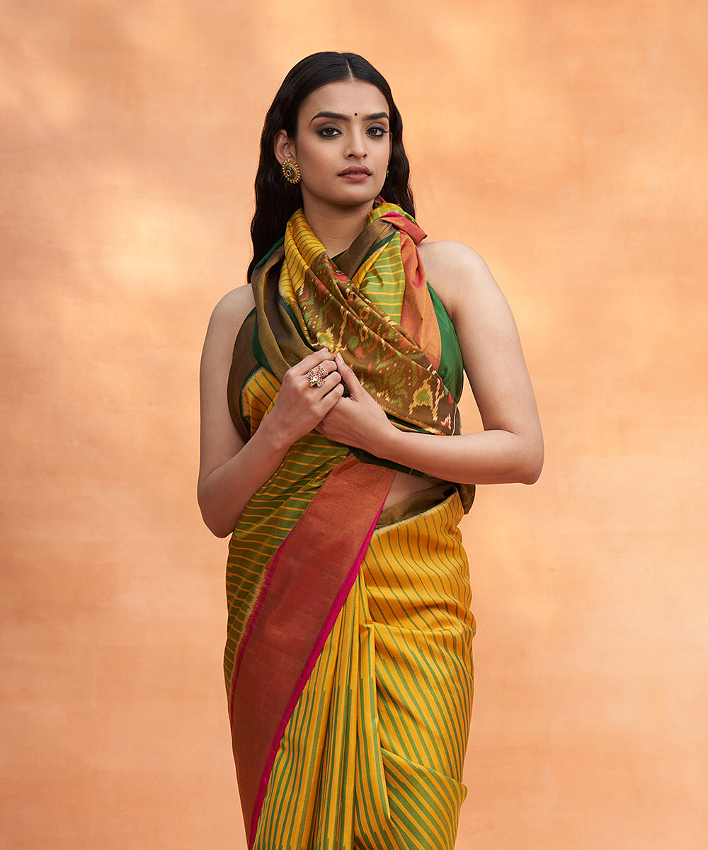 Handloom_Yellow_And_Green_Pure_Mulberry_Silk_Ikat_Patola_Saree_With_Zari_Border_WeaverStory_01