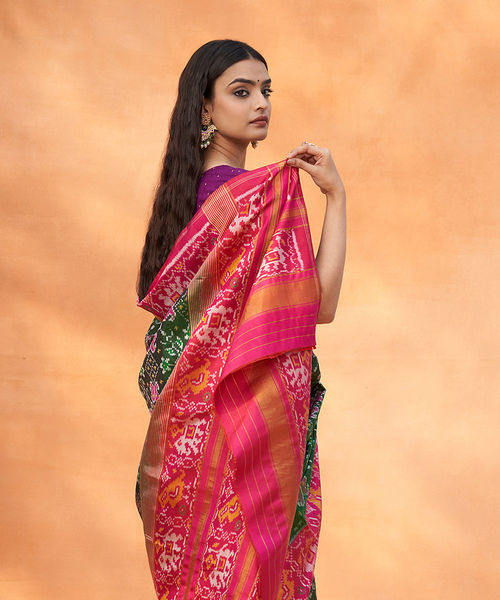 Handloom_Green_And_Magenta_Pure_Mulberry_Silk_Ikat_Patola_Saree_With_Elephants_On_Pallu_WeaverStory_01
