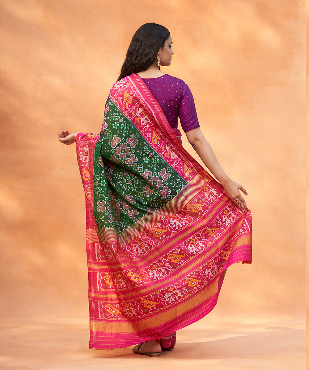 Handloom_Green_And_Magenta_Pure_Mulberry_Silk_Ikat_Patola_Saree_With_Elephants_On_Pallu_WeaverStory_03