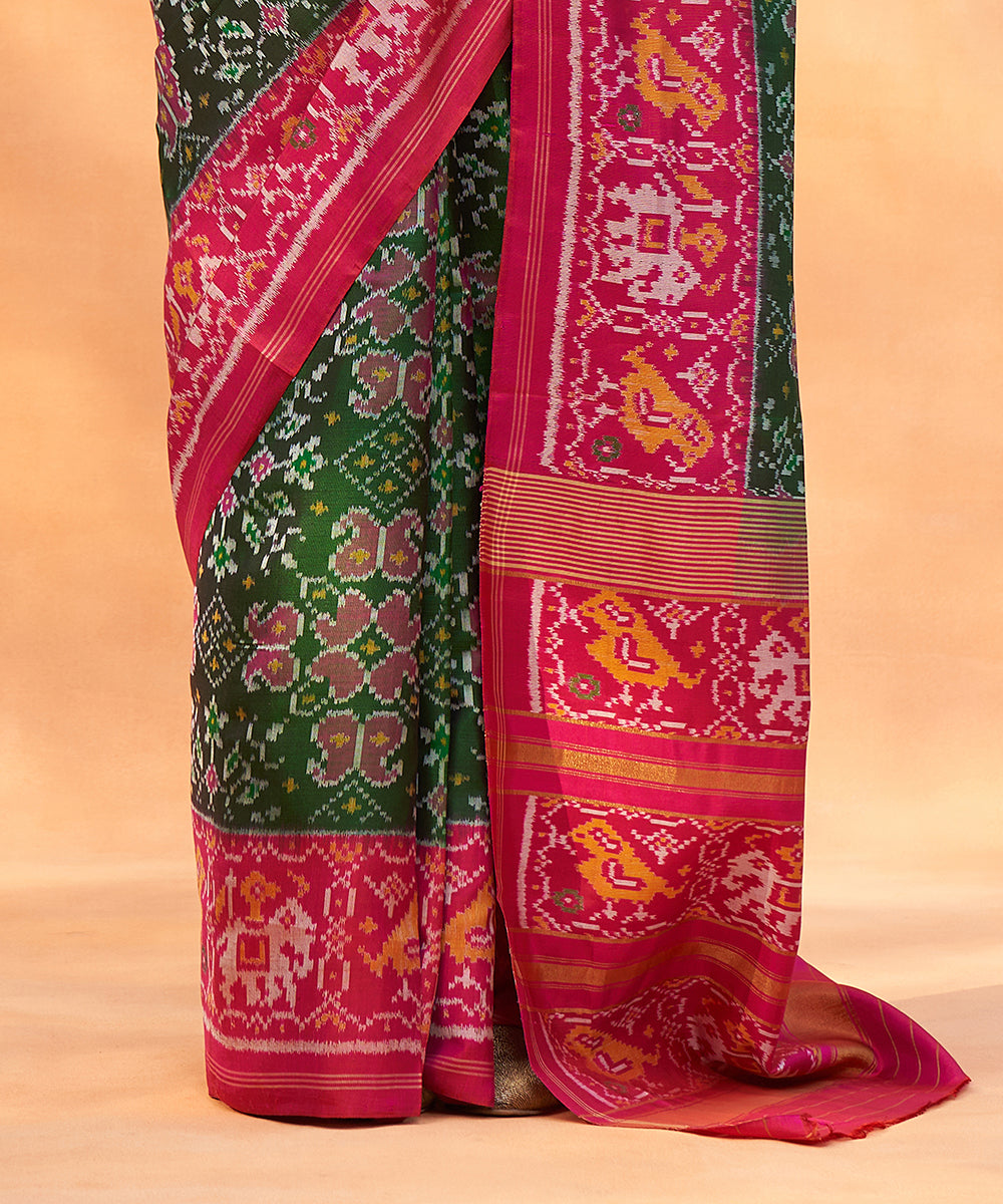 Handloom_Green_And_Magenta_Pure_Mulberry_Silk_Ikat_Patola_Saree_With_Elephants_On_Pallu_WeaverStory_04