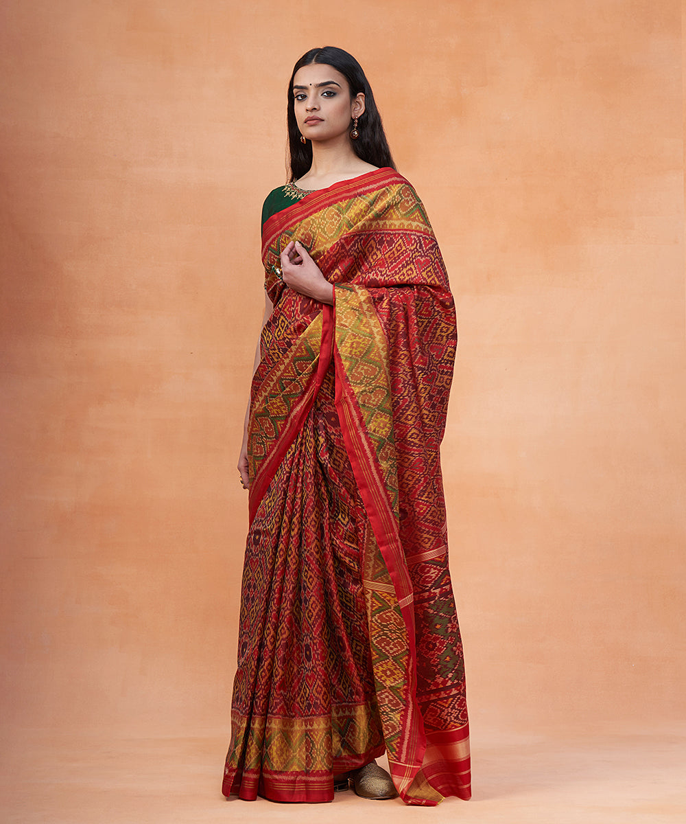 Maroon_And_Green_Handloom_Pure_Mulberry_Silk_Ikat_Patola_Saree_With_Zari_Border_WeaverStory_02