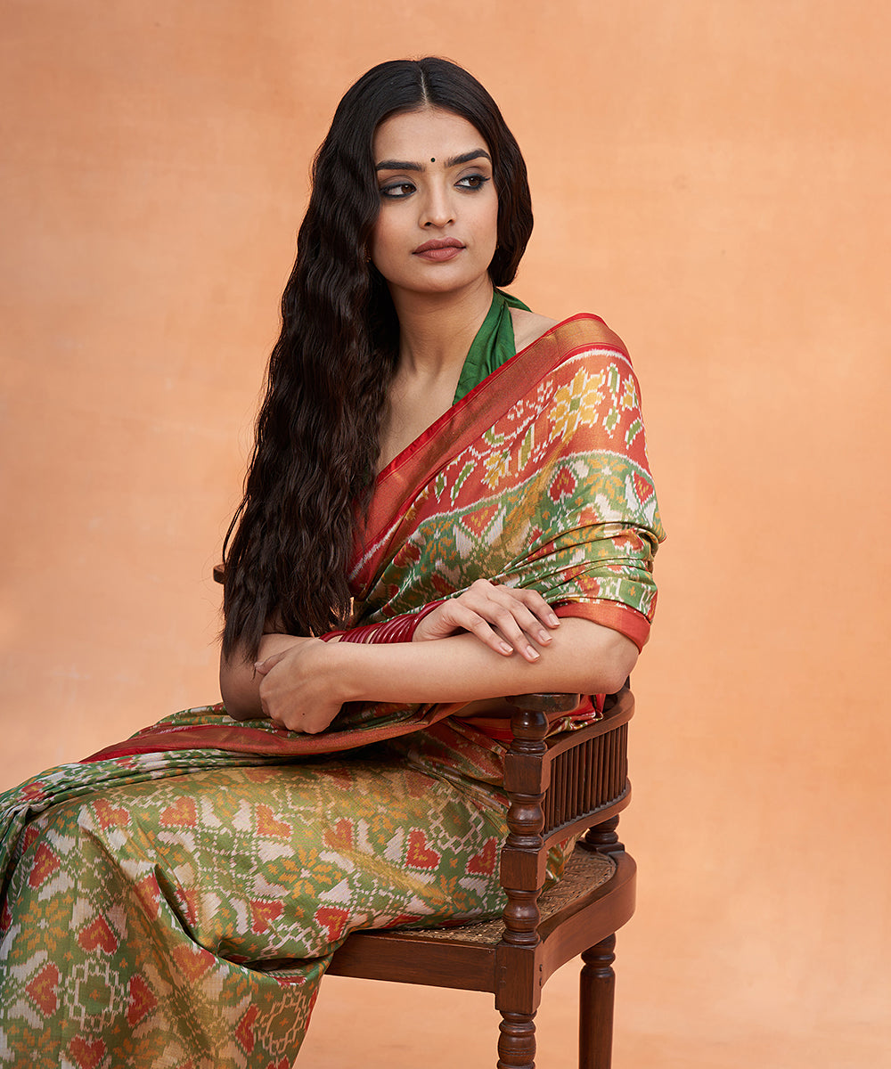 Handloom_Green_And_Rust_Pure_Mulberry_Tissue_Patola_Saree_With_Red_Border_WeaverStory_01