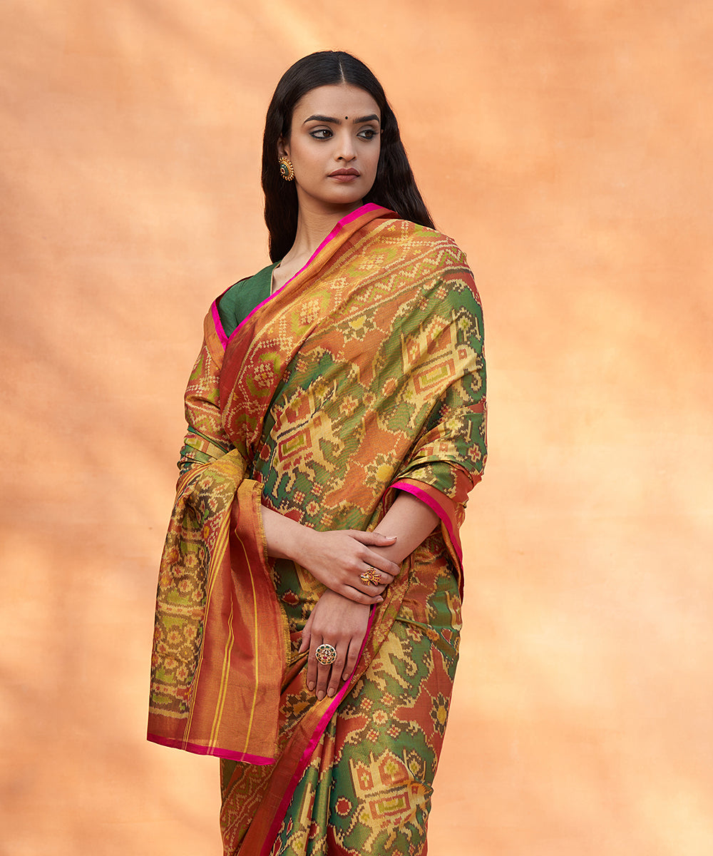 Rust_And_Green_Handloom_Pure_Mulberry_Tissue_Patola_Saree_With_Pink_Border_WeaverStory_01