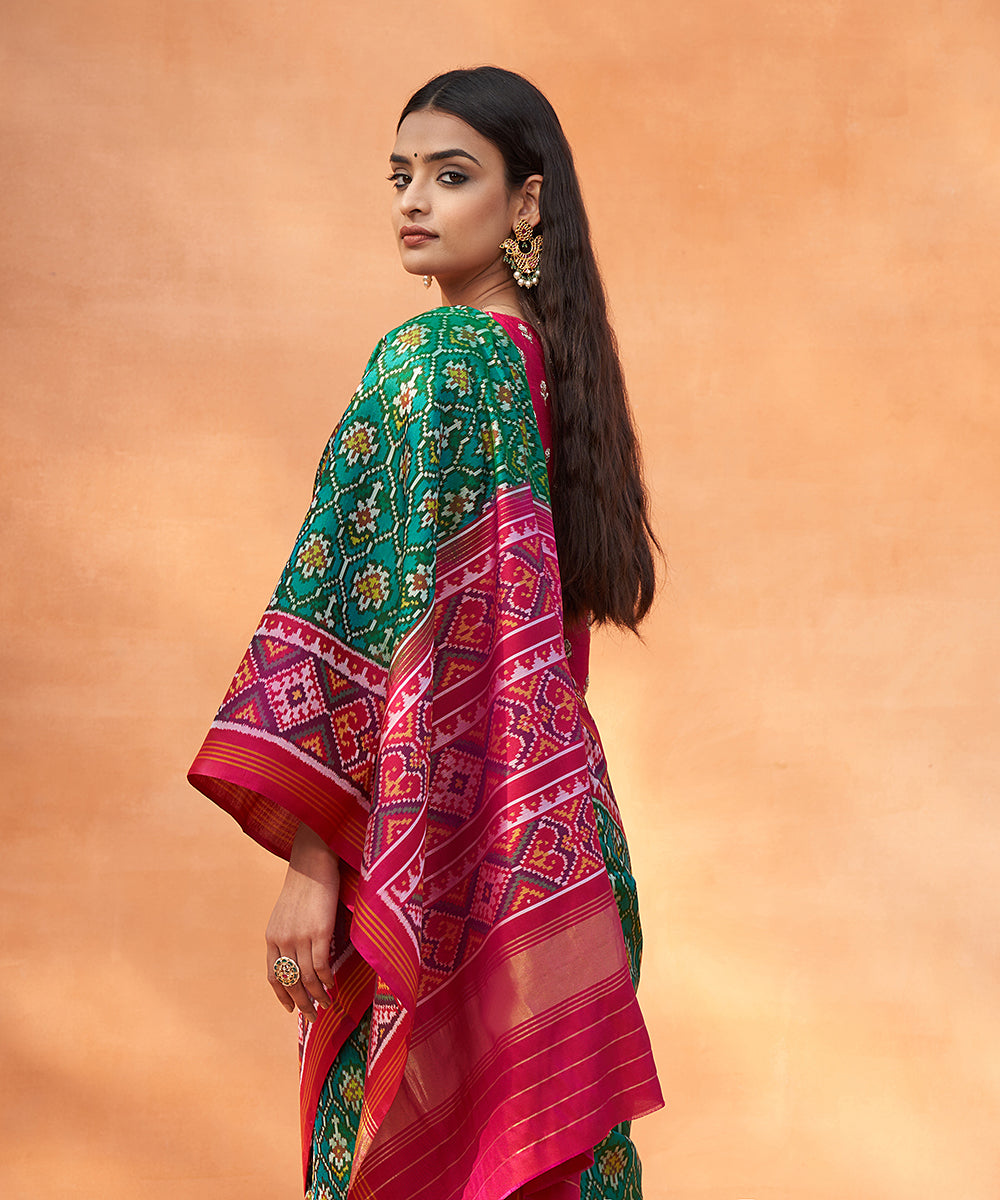 Handloom_Green_And_Magenta_Pure_Mulberry_Silk_Ikat_Patola_Saree_WeaverStory_01