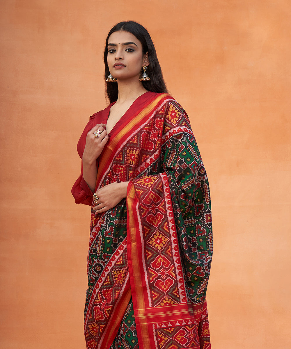 Red_And_Green_Handloom_Pure_Mulberry_Silk_Ikat_Patola_Saree_WeaverStory_01