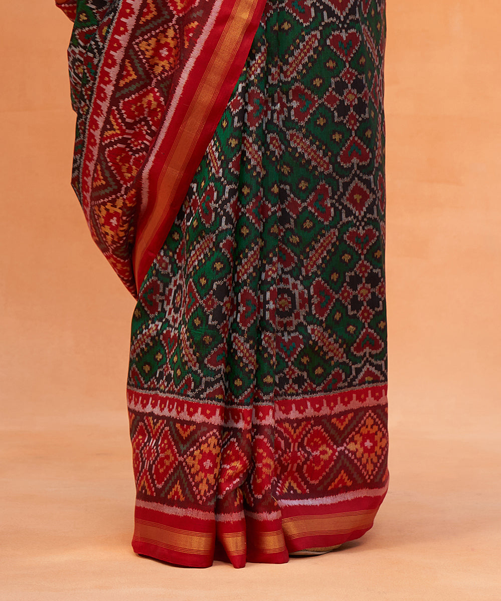 Red_And_Green_Handloom_Pure_Mulberry_Silk_Ikat_Patola_Saree_WeaverStory_04