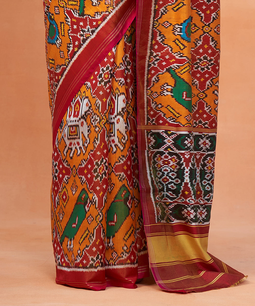 Red_And_Mustard_Pure_Mulberry_Tissue_Ikat_Patola_Saree_With_Parrot_Motifs_WeaverStory_04