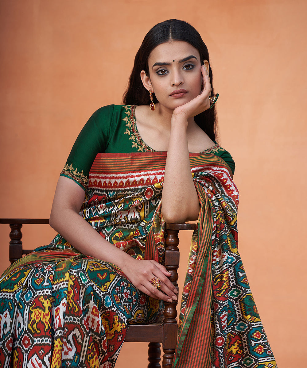 Green_And_Maroon_Pure_Mulberry_Tissue_Ikat_Patola_Saree_With_Animal_Motifs_WeaverStory_01