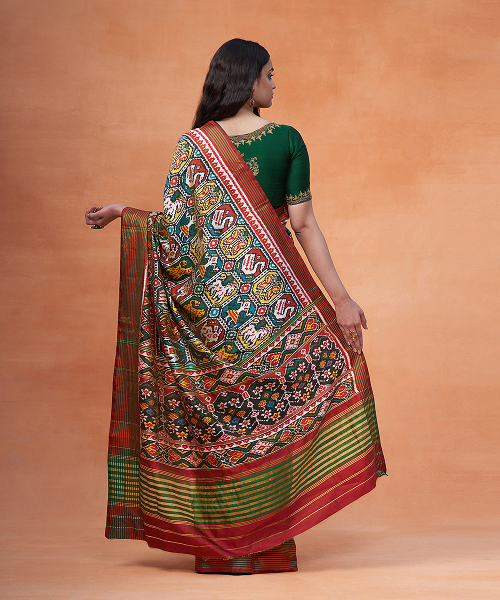 Green_And_Maroon_Pure_Mulberry_Tissue_Ikat_Patola_Saree_With_Animal_Motifs_WeaverStory_03