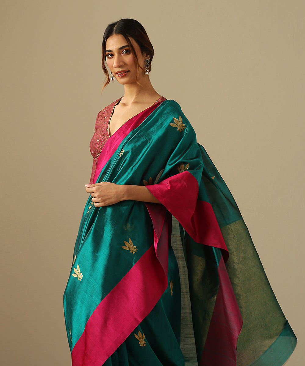 Teal_Handloom_Pure_Chanderi_Silk_Saree_With_Floral_Motifs_And_Pink_Mashroo_Border_WeaverStory_01