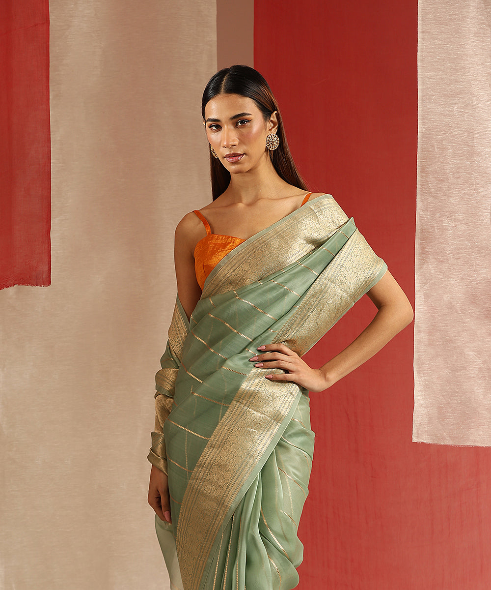 Handloom_Sage_Green_Pure_Kora_Silk_Banarasi_Saree_With_Gold_Zari_Stripes_And_Kadhwa_Border_WeaverStory_01