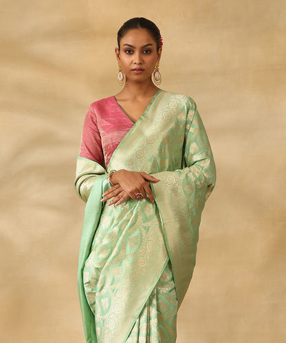 Sea_Green_Handloom_Pure_Katan_Silk_Banarasi_Saree_With_All_Over_Zari_Jaal_In_Cutwork_Weave_WeaverStory_02