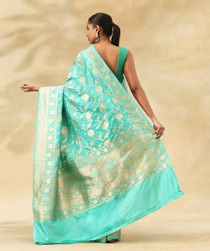 Handloom_Turquoise_Blue_Pure_Katan_Silk_Banarasi_Saree_With_All_Over_Floral_Zari_Jaal_WeaverStory_03