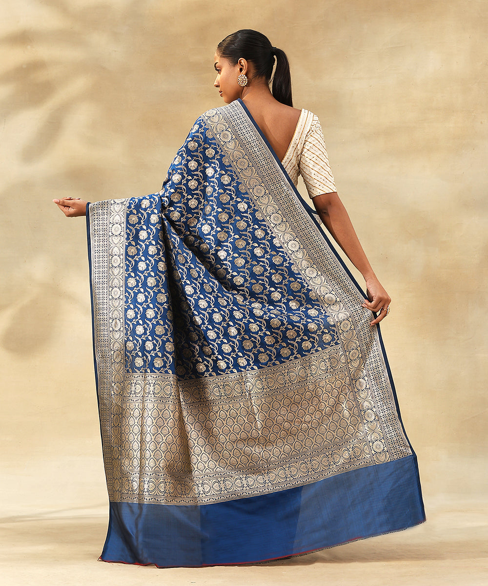 Deep_Blue_Handloom_Pure_Katan_Silk_Banarasi_Saree_With_Zari_Jaal_And_Flowers_WeaverStory_03