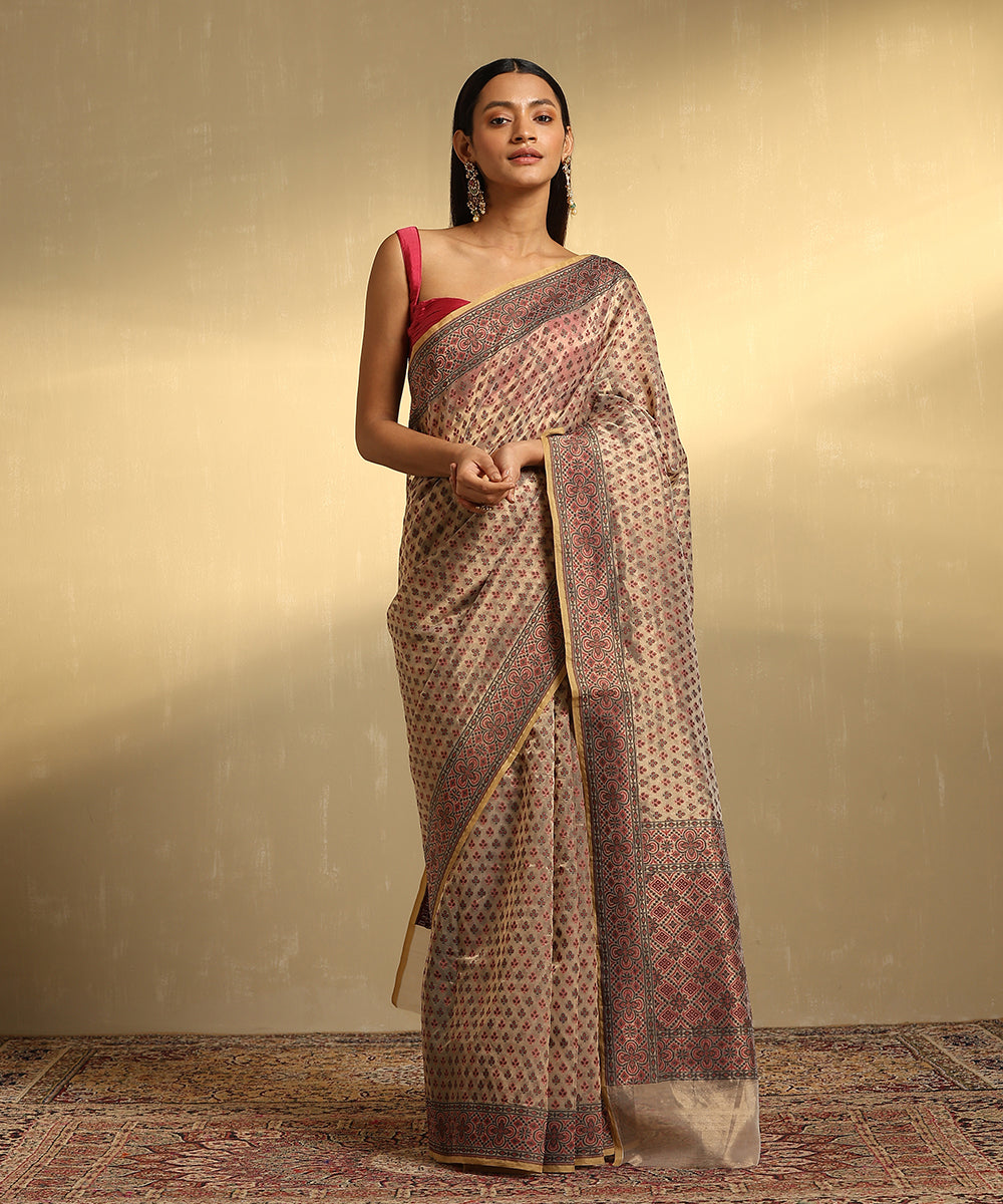 Handloom_Beige_Pure_Tissue_Kora_Banarasi_Saree_With_Red_And_Black_Motifs_WeaverStory_01