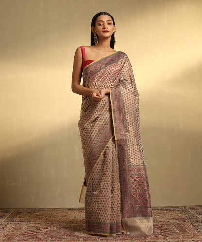 Handloom_Beige_Pure_Tissue_Kora_Banarasi_Saree_With_Red_And_Black_Motifs_WeaverStory_01