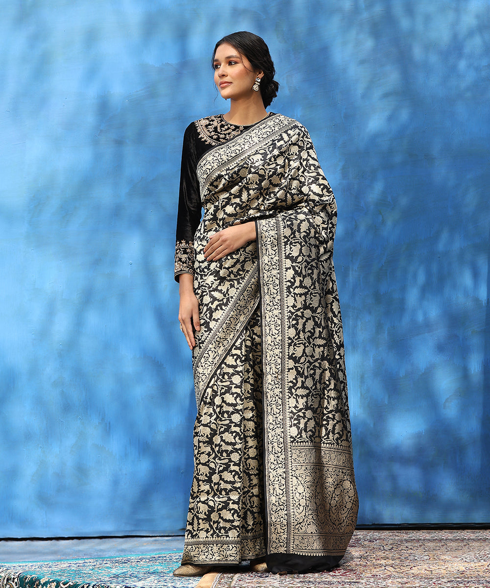 Black_Handloom_Pure_Katan_Silk_Shikargah_Banarasi_Saree_With_Lions_And_Deers_On_Border_WeaverStory_01