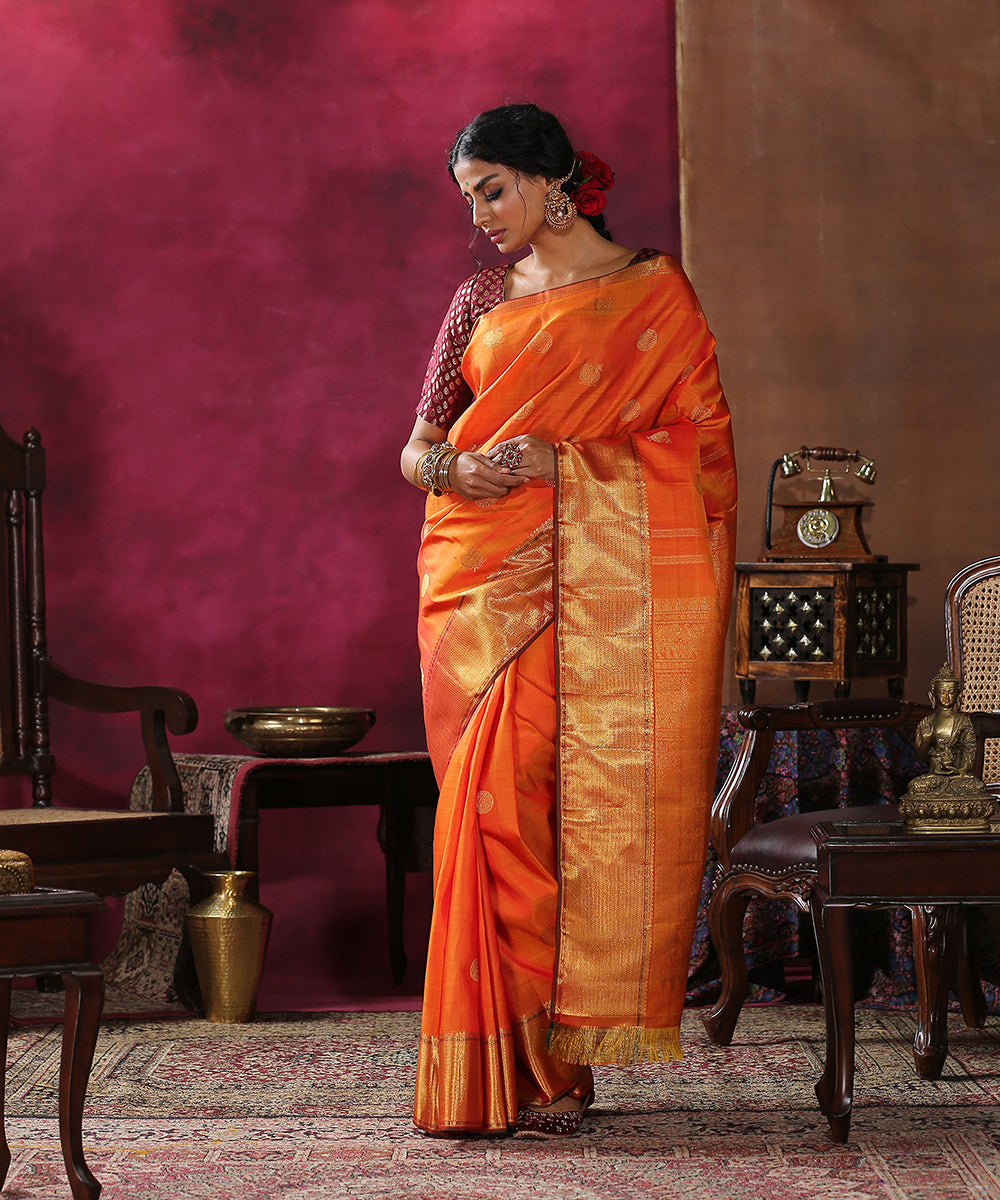 Handloom_Orange_Pure_Silk_Kanjivaram_Saree_with_Broad_Gold_Zari_Border_WeaverStory_02