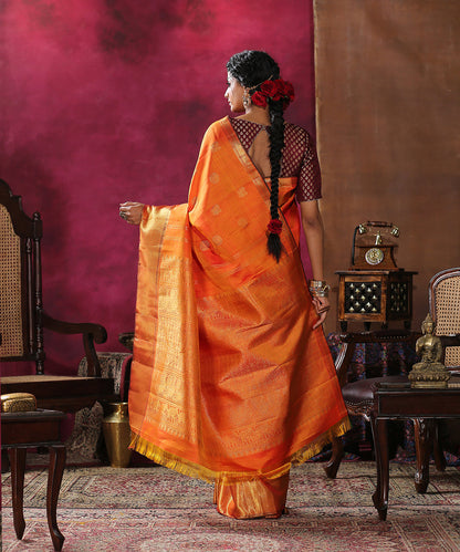 Handloom_Orange_Pure_Silk_Kanjivaram_Saree_with_Broad_Gold_Zari_Border_WeaverStory_03