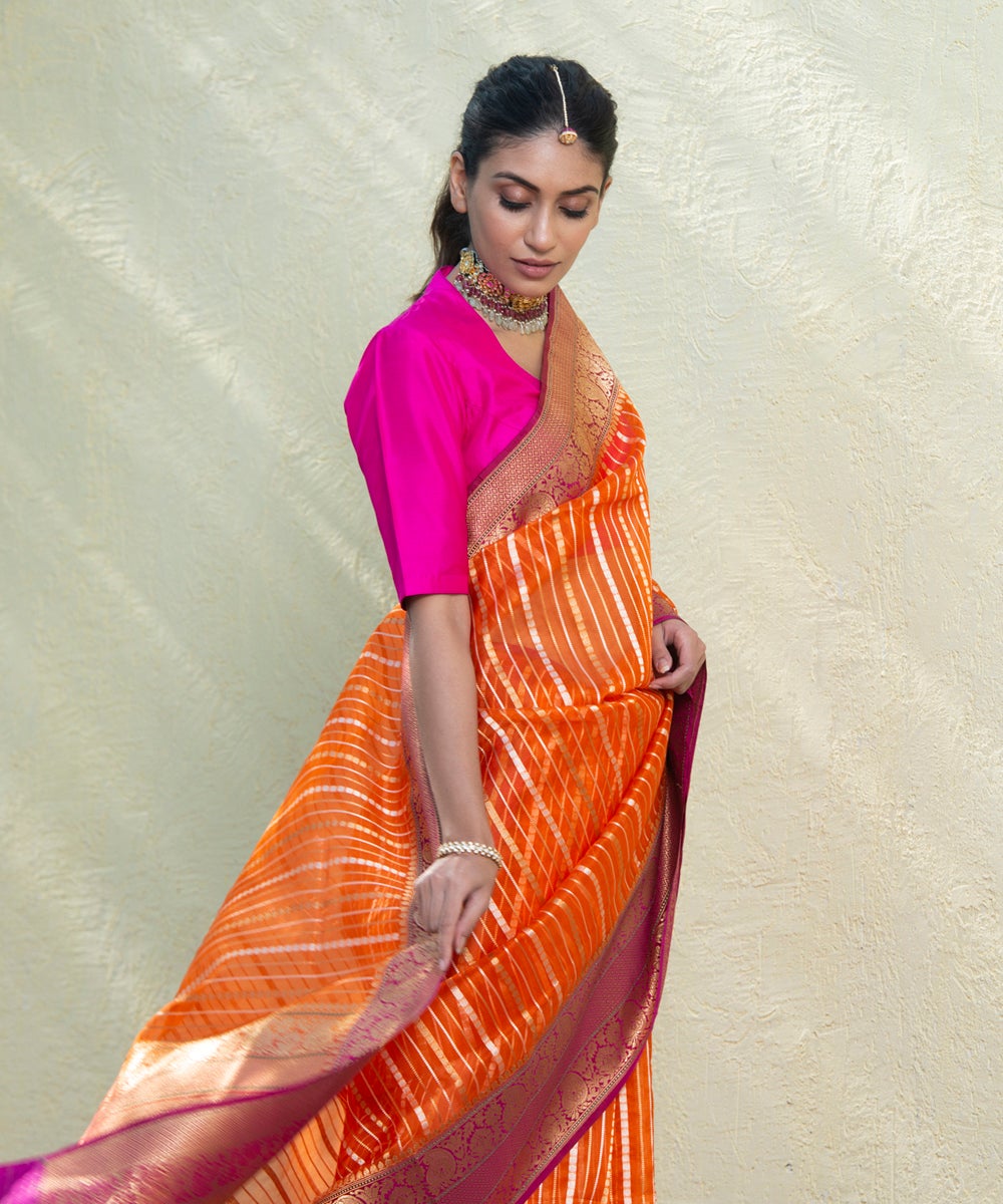 Orange_Handloom_Kora_Silk_Banarasi_Saree_With_Purple_Kadhiyal_Border_WeaverStory_01