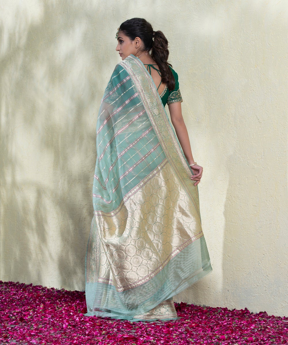 Light_Blue_Handloom_Kora_Silk_Banarasi_Saree_With_Zari_Stripes_And_Floral_Border_WeaverStory_03