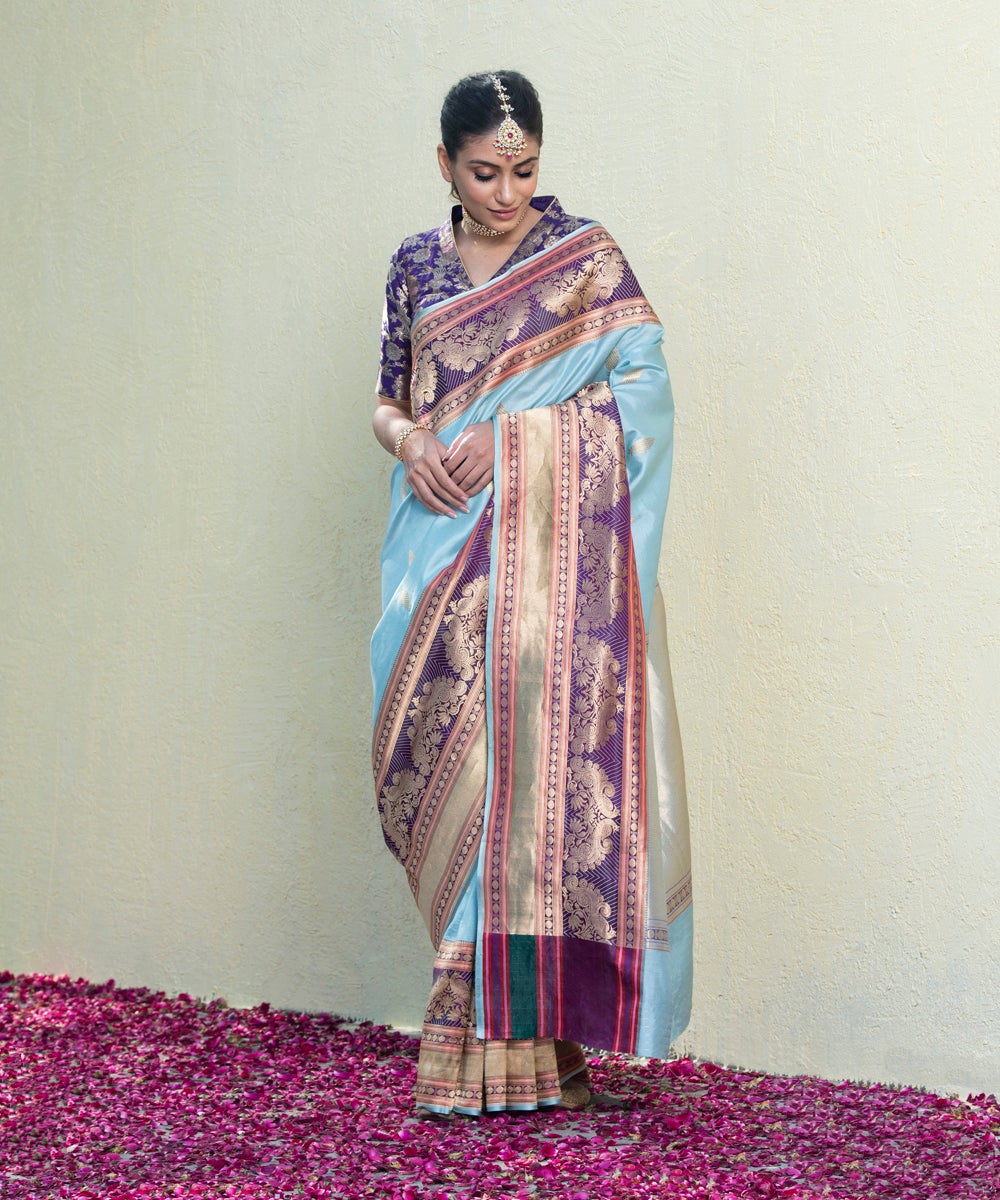 Handloom_Powder_Blue_Pure_Katan_Silk_Banarasi_Saree_with_Kadhwa_Booti_and_Purple_Border_With_Peacocks_WeaverStory_02