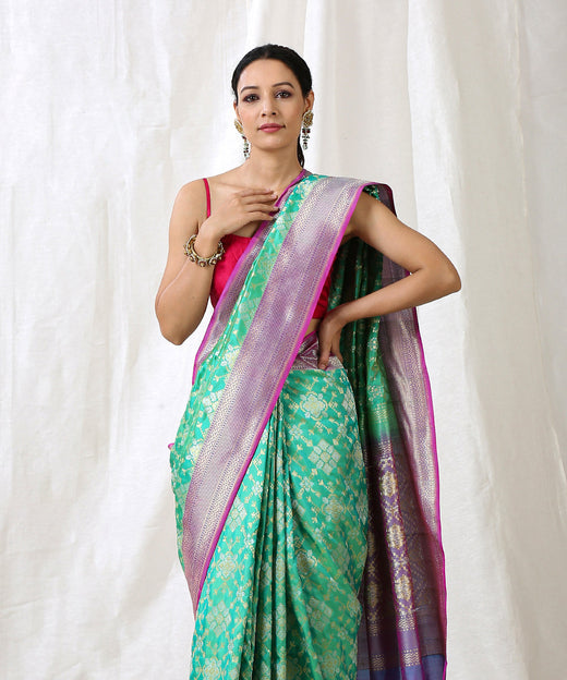 Aqua Green Handloom Pure Katan Silk Banarasi Patola Saree with Purple Border