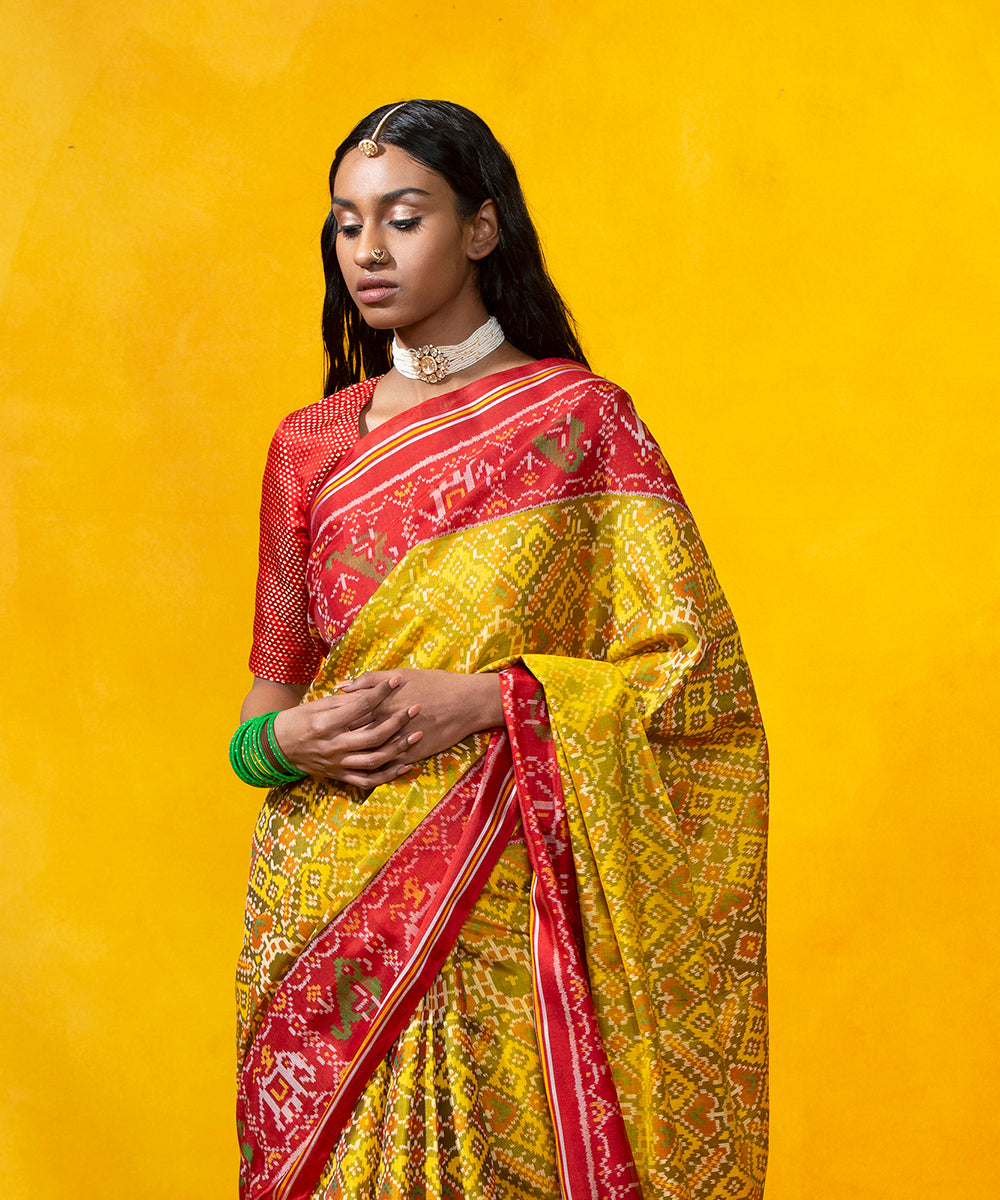 Handloom_Yellow_Mulberry_Silk_Patola_Saree_With_Red_Border_Pallu_WeaverStory_01