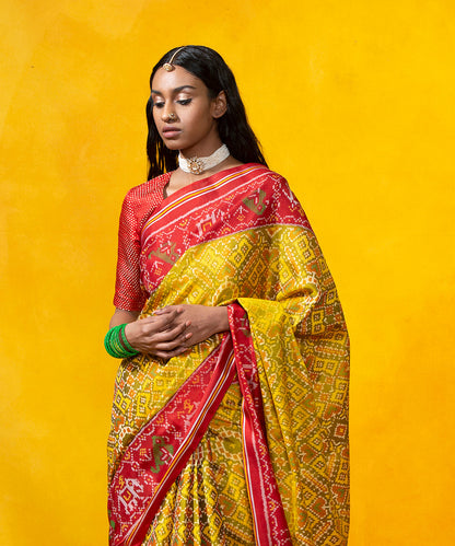 Handloom_Yellow_Mulberry_Silk_Patola_Saree_With_Red_Border_Pallu_WeaverStory_01