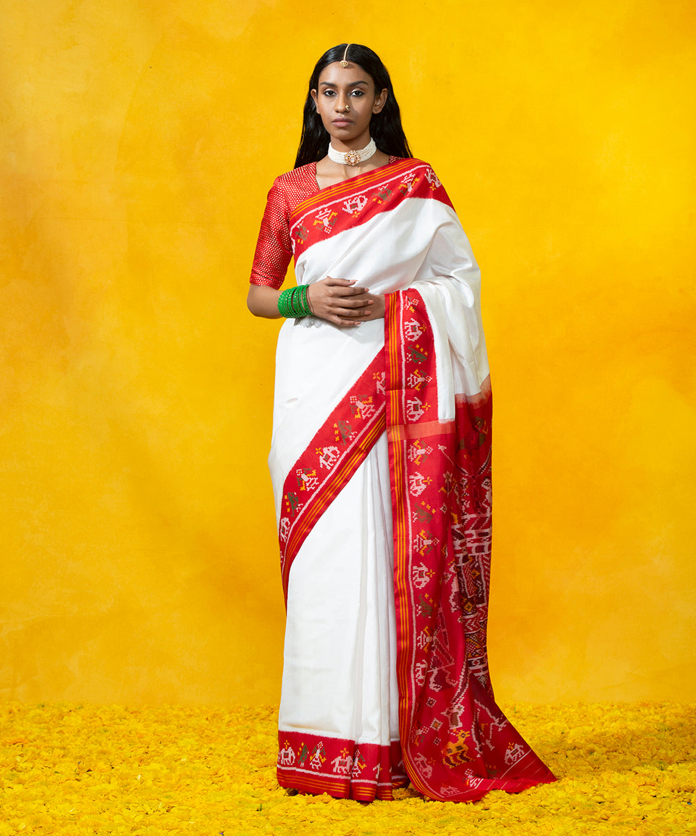 White_Handloom_Mulberry_Silk_Patola_Saree_With_Red_Border_and_Pallu_with_Elephant_Motif_WeaverStory_02